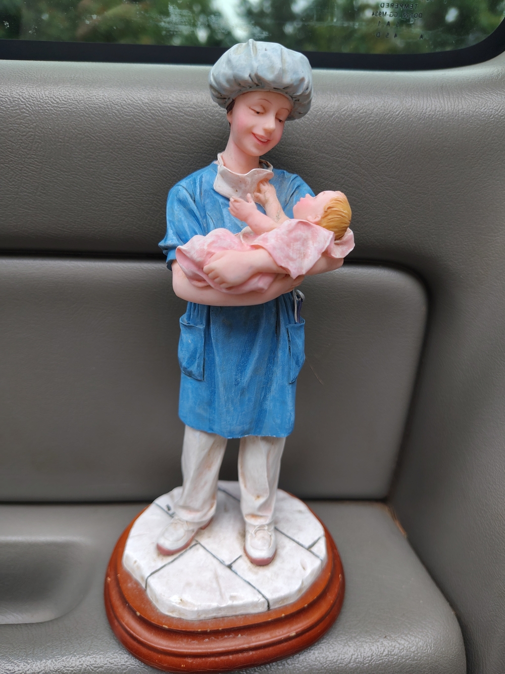 Figurine: Nurse Holding Baby - Blue and Pink Home Art